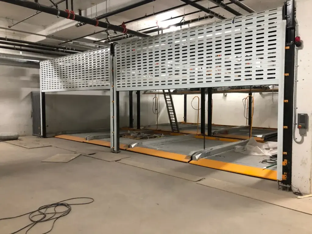 Two level tandem puzzle parking system for automated parking