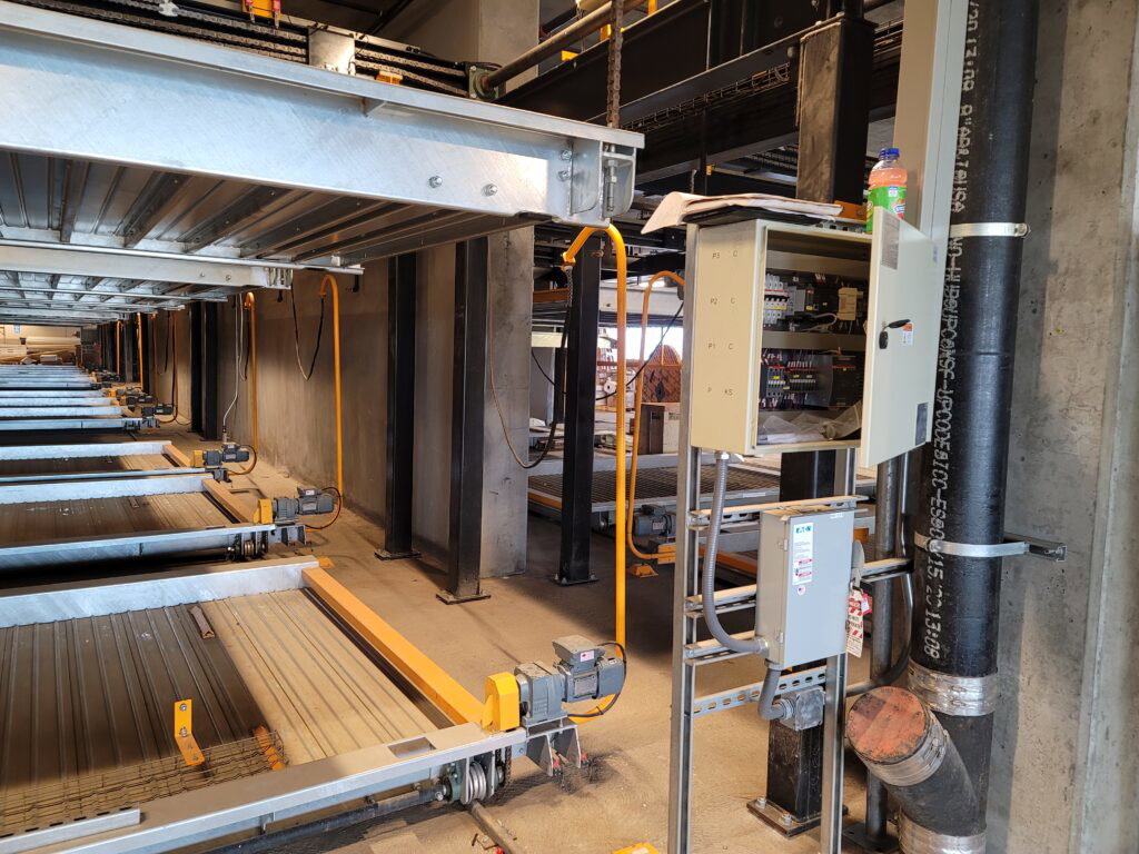 Parking stacker installation photo showing automated parking equipment in a garage