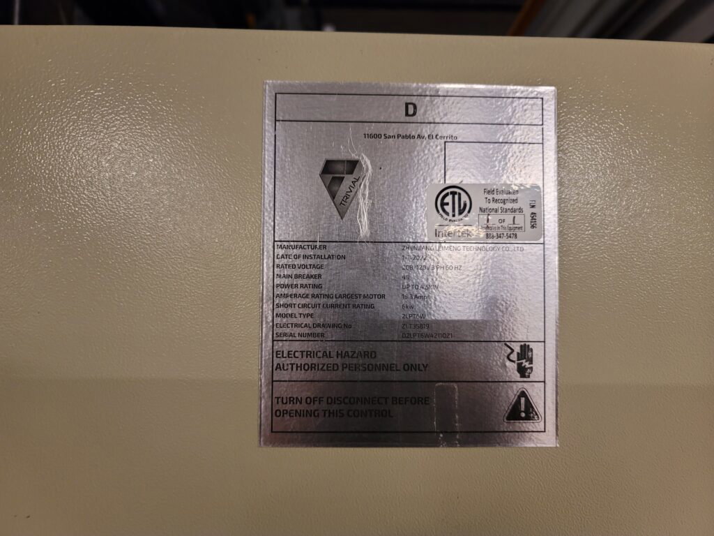 Automated parking lift installation detail inside a garage